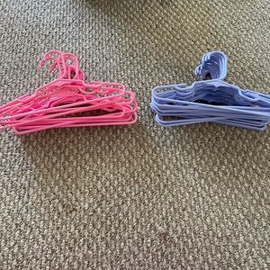 Set of Pink and Purple Plastic Hangers
